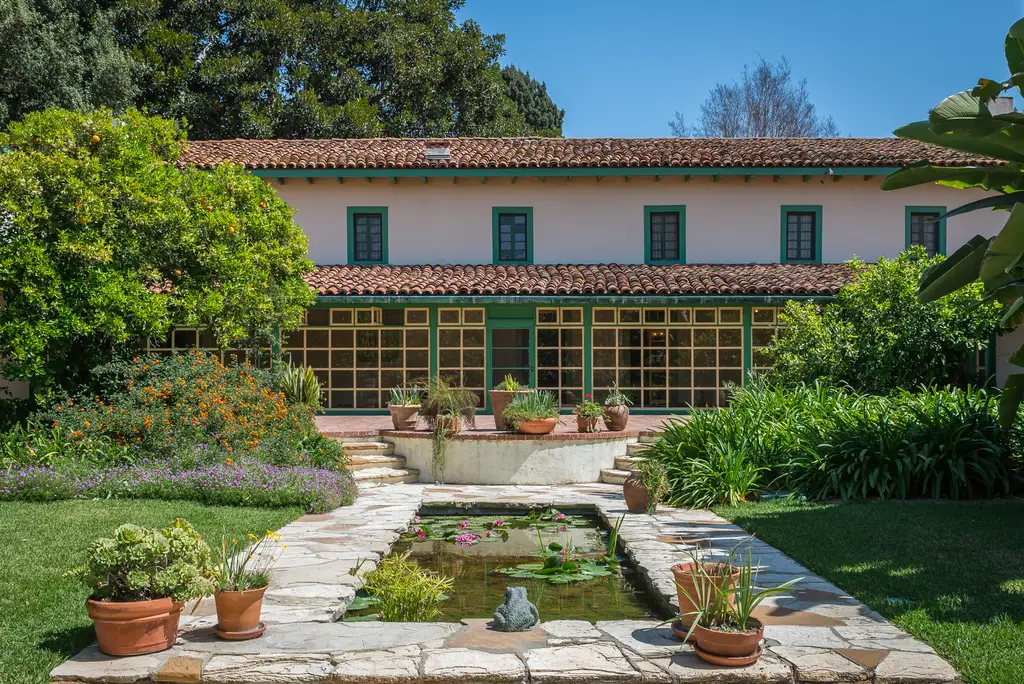Spanish-style house with garden and koi pond