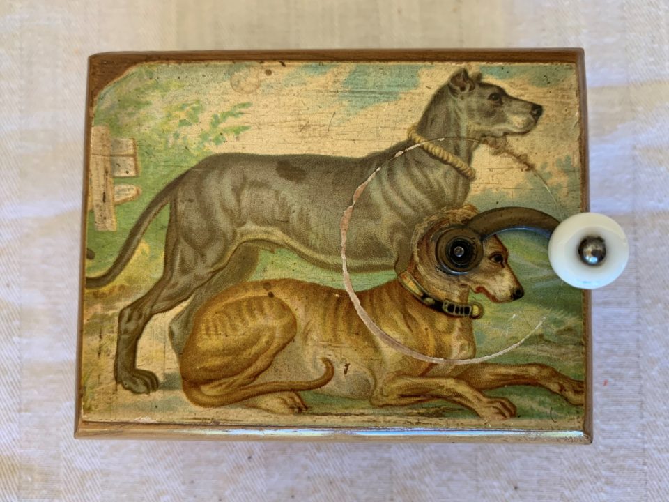 Vintage dog illustration on a mechanical device