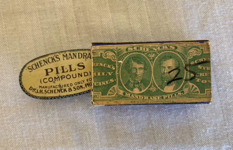 Schenck's Mandrake Pills vintage packaging on display.