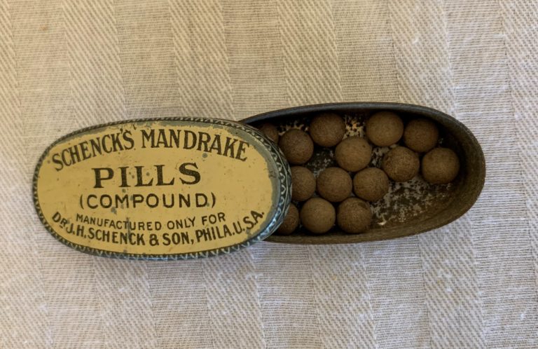 Vintage Schenck's Mandrake Pills container with pills inside.