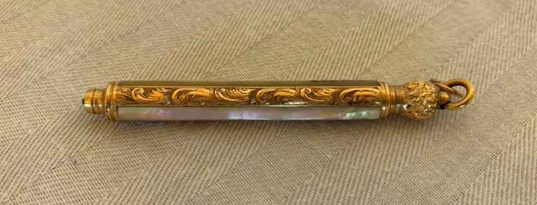 Ornate gold and pearl antique needle case